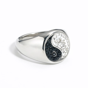 Macro shot of the punk Tai Chi Yin Yang ring with black and white rhinestones