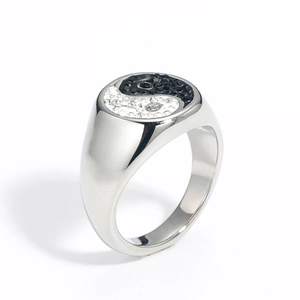 Polished stainless steel ring featuring a classic Yin Yang pattern with sparkling crystals