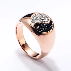 Detailed macro view of rose gold Yin Yang ring featuring black and white pave crystal inlay