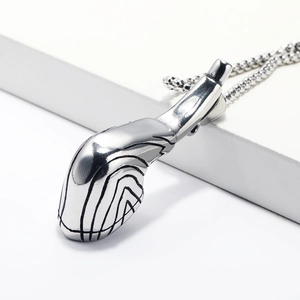 Vintage silver stainless steel punk pipe pendant necklace on white display block