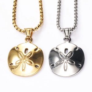 Detailed macro view of gold and silver sand dollar pendants with star pattern