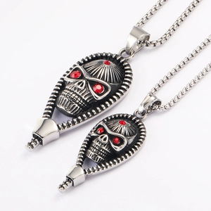 Retro punk skull pendant necklace in silver stainless steel with red rhinestone details