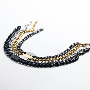 Cuban link bracelet set in gold, silver, black, and gunmetal with oval engravable metal plate