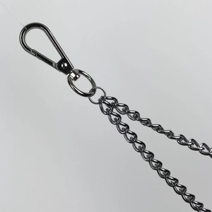 Detail view of punk style double metal trouser chains with a sturdy lobster clasp