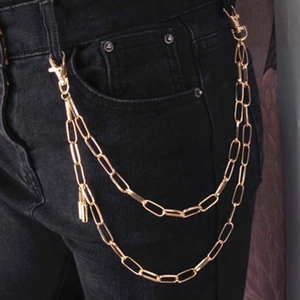 Double layer gold pants chain with punk lock design and lobster clasps on black denim