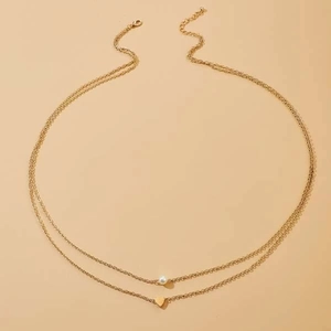 Chaîne de taille dorée à deux rangs avec imitation perle et pendentif cœur