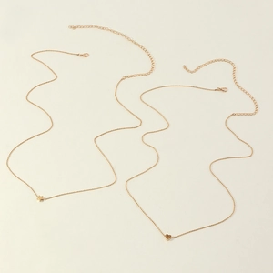 Golden heart and star layered body chains with bead detail and adjustable clasp