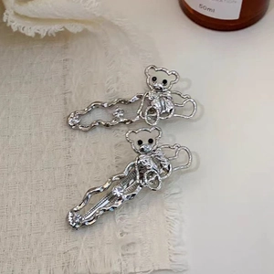 Barrettes à cheveux ours évidé en argent avec strass brillants et design ondulé