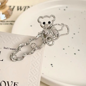 Pince à cheveux ours en métal argenté avec texture martelée et strass scintillants