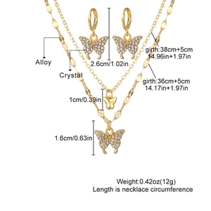 Ensemble collier papillon doré à double rangée et boucles d'oreilles en cristaux