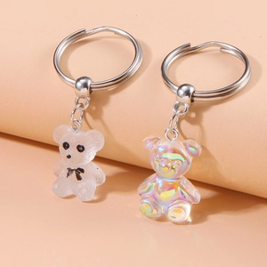 Cute bow bear keychains in matte white and holographic finish for bags and keys