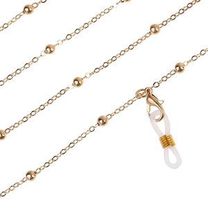Detail of gold bead chain with lobster clasp and silicone loop for glasses or face masks