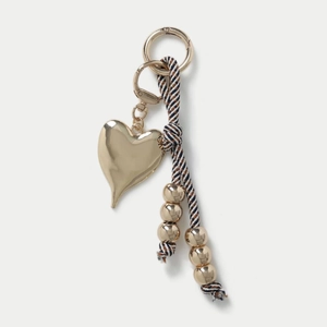 Polished gold heart charm with navy striped rope and metal beads for bags and keys