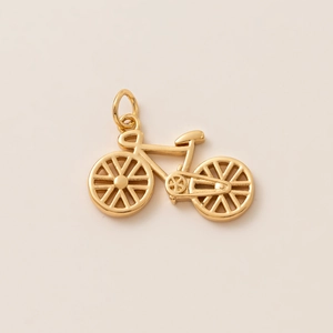 Detailed close-up of a high-quality gold-plated bicycle pendant for DIY jewelry