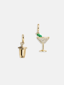Macro shot of 18K gold plated cocktail and drink cup earrings with white crystals