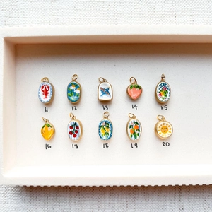 DIY 18K gold-plated strawberry and floral pendants set in various colorful enamel designs