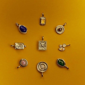 Collection of vintage 18K gold plated stainless steel pendants with lapis and malachite