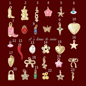 Detailed grid of diverse 18K gold plated stainless steel pendants with charms