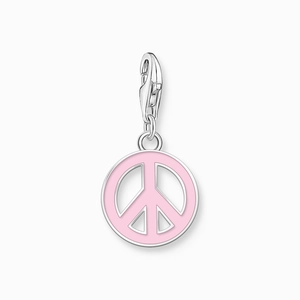 Close-up of pink enamel peace sign pendant with silver-tone clasp and polished finish