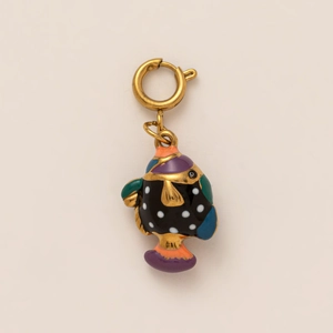 Detailed view of a tropical fish pendant with colorful enamel and gold spring clasp