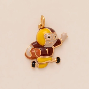 Detail of rugby player enamel pendant in 18K gold plating for DIY keychains