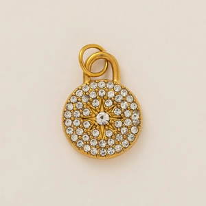 18K gold plated stainless steel round medallion pendant with zircon starburst design