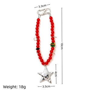 Handmade red beaded star charm with silver metal star pendant and glass beads