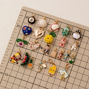 22-delige set emaille bedels met citroen, pinguïn en honkbal voor DIY sieraden maken