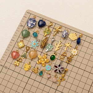 Variety of 18K gold plated stainless steel floral and clover charms for DIY jewelry making