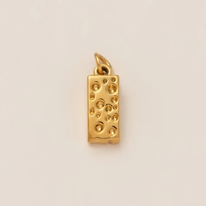 Detailed view of 18K gold plated rectangular pendant with unique cheese-like crater texture