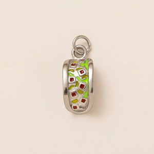 Detailed view of 18K gold taco charm with colorful enamel fillings and polished metal ring