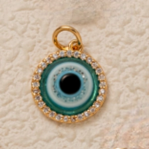 Detailed view of evil eye pendant with vibrant enamel inlay and sparkling zircon crystals
