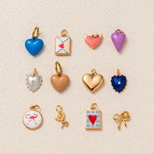 Detailed set of 12 DIY jewelry pendants with hearts, envelopes and bow designs