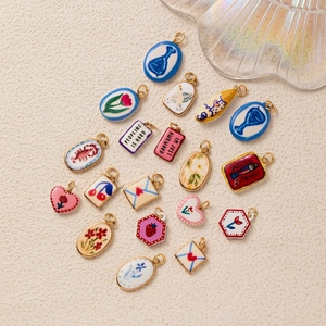 Colorful assorted ceramic style pendants with gold metal frames for DIY jewelry