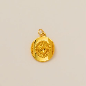 Close-up of a gold hat pendant with polished finish and beaded edge detailing