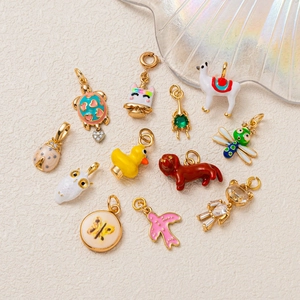 Minimalist animal pendants in gold plated copper with enamel and cubic zirconia stones