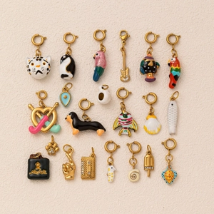 Collection of 18 colorful animal and object pendants in gold-plated stainless steel