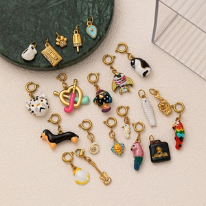 Colorful enamel animal and object charms with gold metal bases and lobster clasps