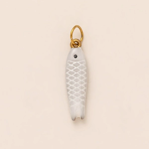 Detail of fish pendant showing fine scale texture and gold-plated bail connector