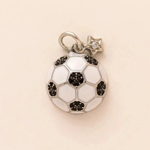 Detailed view of enamel soccer ball pendant with a sparkling star charm and 18K gold hook