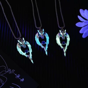 Luminous wolf totem pendant necklaces with blue glowing gemstones and wing details