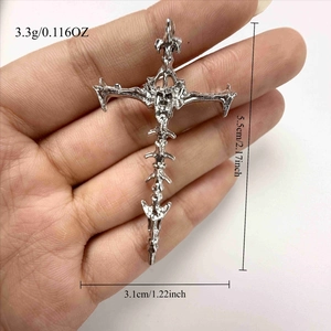 Gothic skull skeleton cross pendant showing dimensions 5.5cm by 3.1cm and 3.3g weight