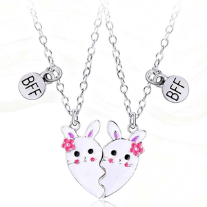 Cartoon magnetic BFF heart necklaces with white bunnies and engraved BFF metal tags