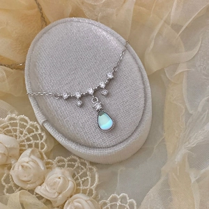 Silver teardrop moonstone necklace with delicate sparkling crystals for women