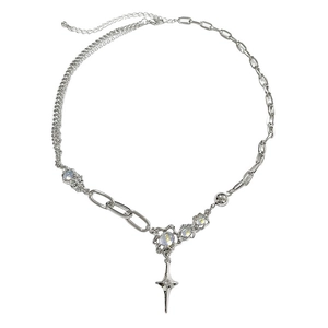 Detailed view of silver moonstone cross necklace with asymmetrical Y2K punk style chain