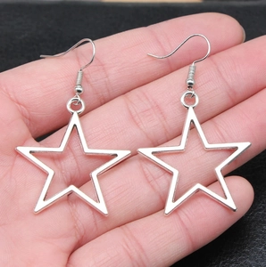Fashionable large hollow star-shaped drop earrings with classic silver fishhook wire