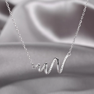 Snake spiral wave pendant necklace in silver finish with pavé cubic zirconia