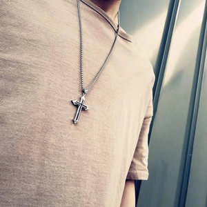 Silver stainless steel cross pendant necklace with layered design for men and women