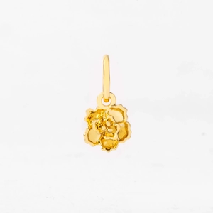 Detailed macro view of a golden rose pendant with 3D layered petals and a secure loop charm