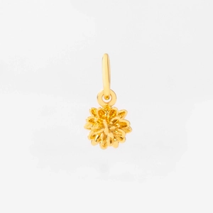 Macro shot of 3D layered gold flower pendant with intricate petal details and top ring